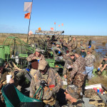 large_group_of_hunters_getting_organized_to_duck_hunt